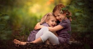 Two cute little sisters playing in the park HD Wallpapers