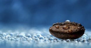 Water on smooth stones brown Wallpaper