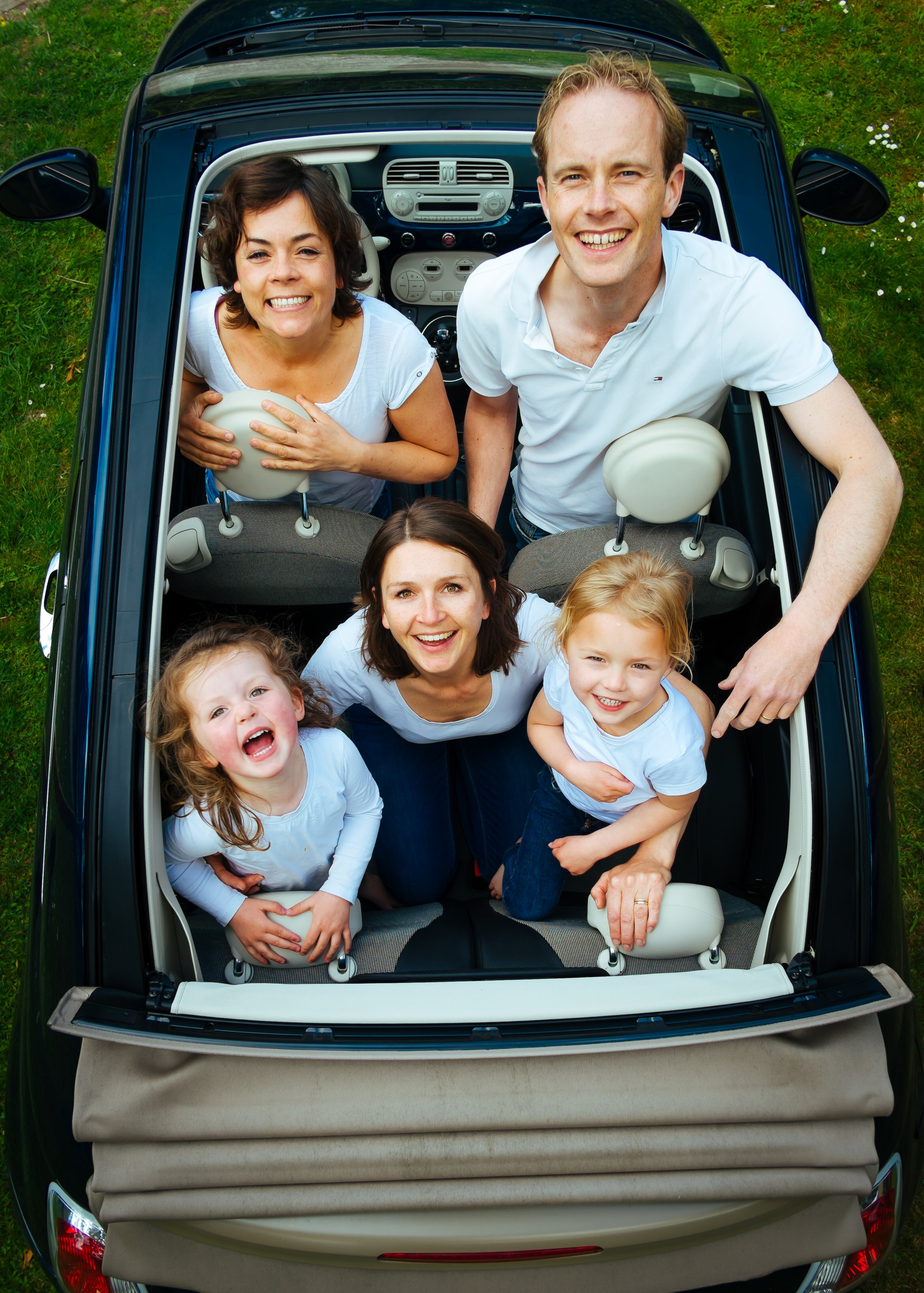 Holiday car travel happy smiling kids mother family dad father generation children mom siblings parents Wallpaper photo