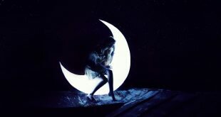 The Photography Girl sitting on the moon Wallpaper