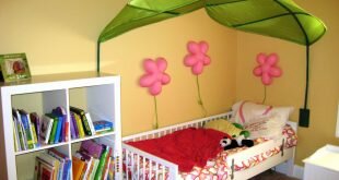 Umbrella over the bed in the nursery Wallpapers