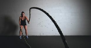 woman sport strong fitness exercise training indoors ropes . Wallpaper